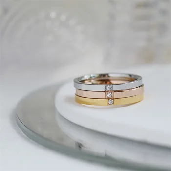 Кольца из нержавеющей стали для женщин и мужчин, Обручальные кольца с одним цирконом, модные украшения Золотого и серебряного цвета, кольца для мужской вечеринки, свадьбы
